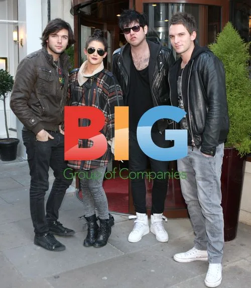 Katie Waissel Spotted with Band in Soho