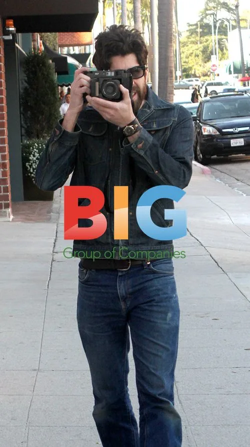 Actor Adam Goldberg plays paparazzo