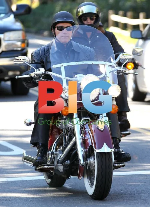 Arnold Schwarzenegger on Motorcycle