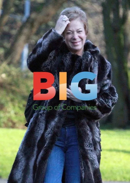 TV presenter Denise Welch outside hospital with husband