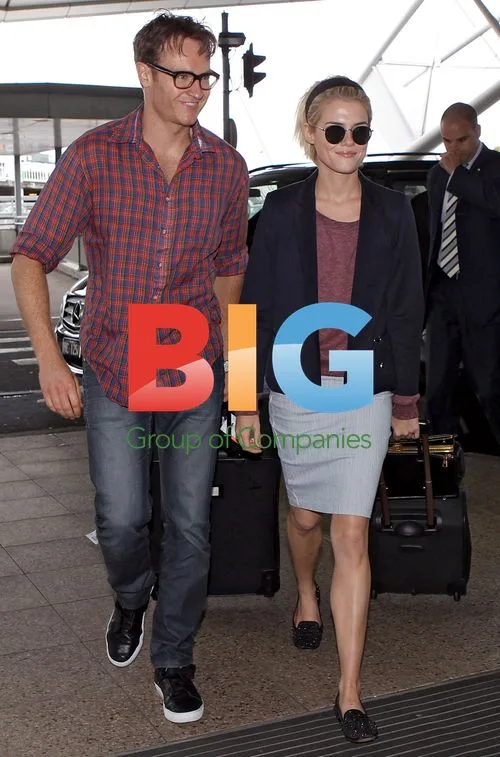 Rachael Taylor and Josh Lawson at Sydney Airport