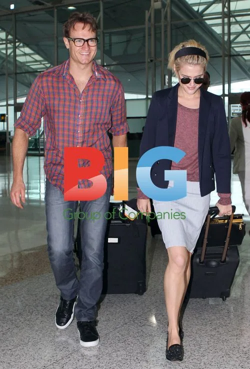 Rachael Taylor and Josh Lawson at Sydney Airport