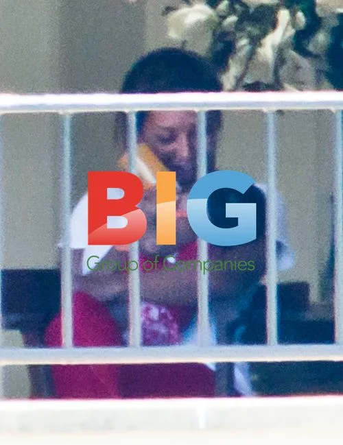 Mel B and Family on Balcony