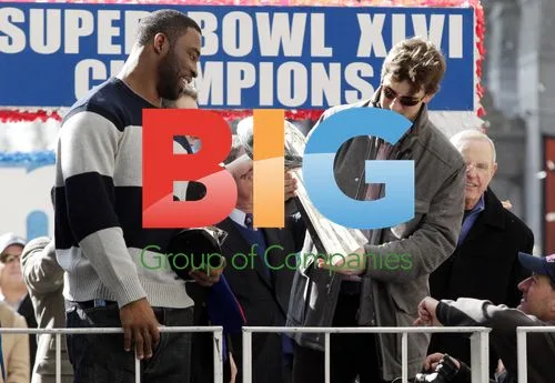 Eli Manning and Tom Coughlin with Lombardi Trophy