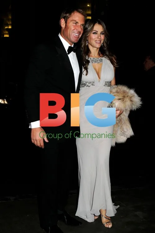 Shane Warne and Elizabeth Hurley Arrive at amfAR Gala