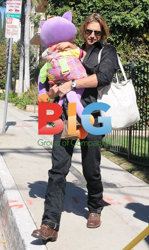 Gabriel Aubry picking up daughter Nahla