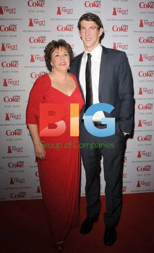 Debbie and Michael Phelps at Heart Truth's Red Dress Collection