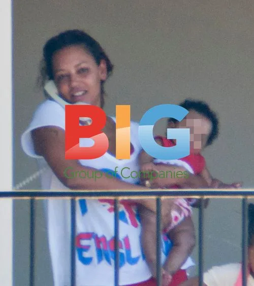 Melanie Brown with family at home