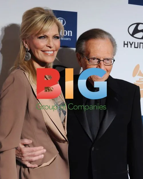 Larry King and wife at Clive Davis pre-Grammy party