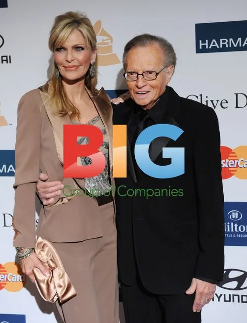 Larry King and wife at Clive Davis pre-Grammy party