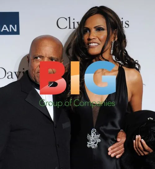 Barry Gordy Jr. and guest at Clive Davis pre-Grammy party