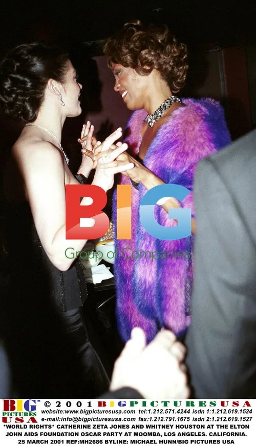 Zeta Jones and Houston at Elton John Oscar Party