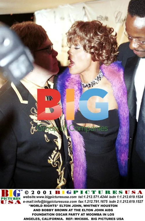 Elton John, Whitney Houston and Bobby Brown at Oscar Party