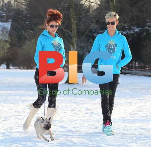 Amy Childs and Harry Derbidge Play in Snow with Pug