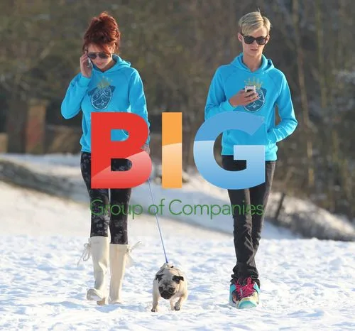 Amy Childs and Harry Derbidge Playing in Snow with Pet Pug