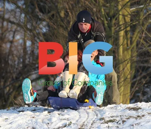 Amy Childs and cousin Harry Derbidge play in snow