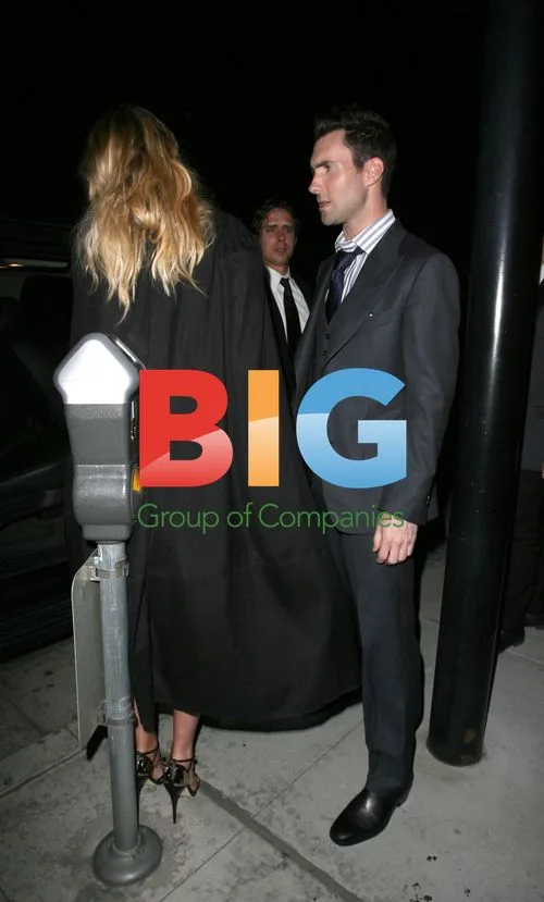 Adam Levine and Anne Vyalitsyna leaving Mastros Steakhouse