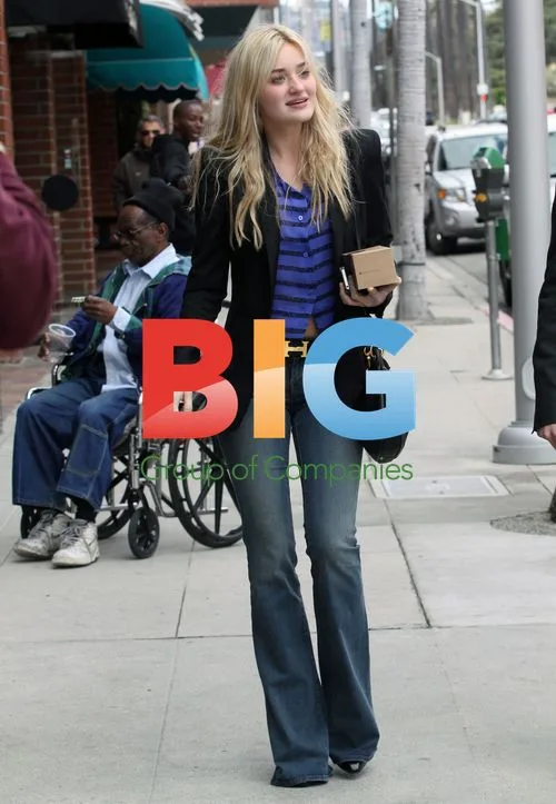 Amanda Michalka laughing with homeless man