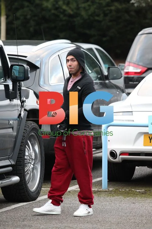 Carlos Tevez trains alone at Carrington