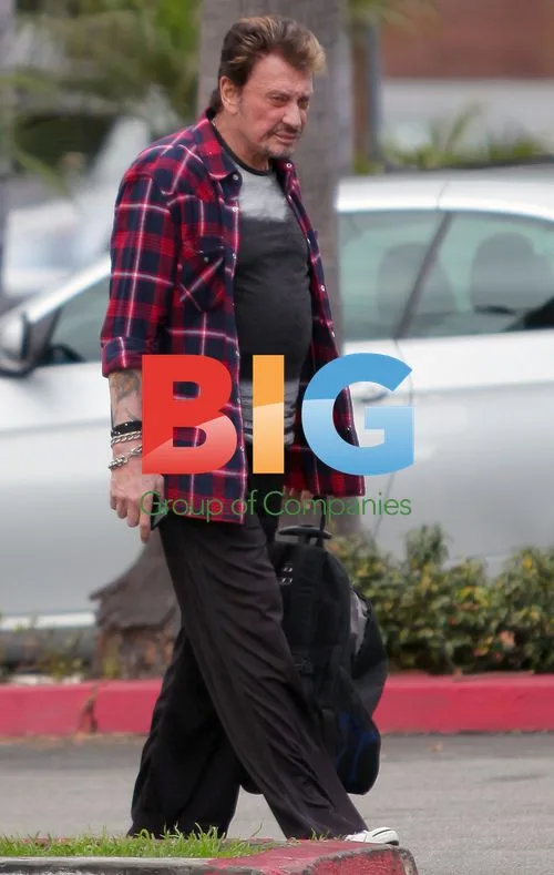 Johnny Hallyday Arrives at Gold's Gym