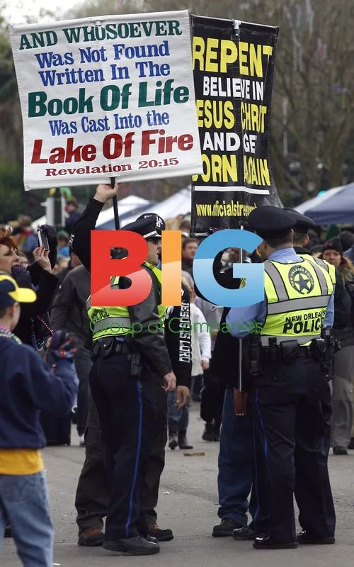Police talk to religious protesters at Carnival