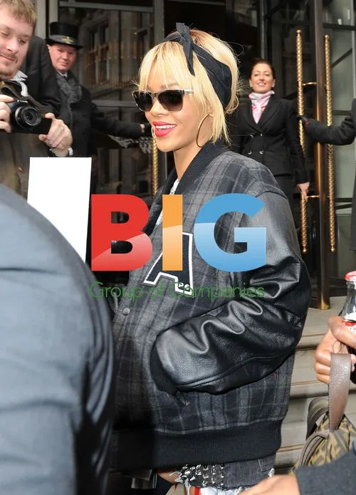Rihanna Shares Hugs and Kisses with Fans in London