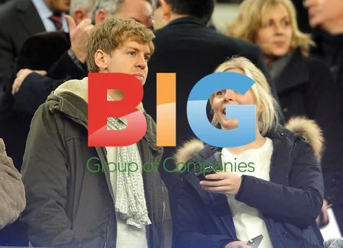Sebastian Vettel and Hanna Prater watch Barcelona match