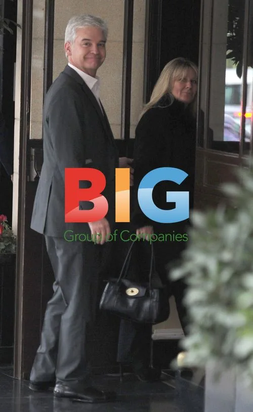 Phillip Schofield and wife arrive to Simon Cowell's tea party