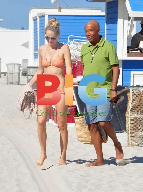 Russell Simmons Kisses New Girlfriend