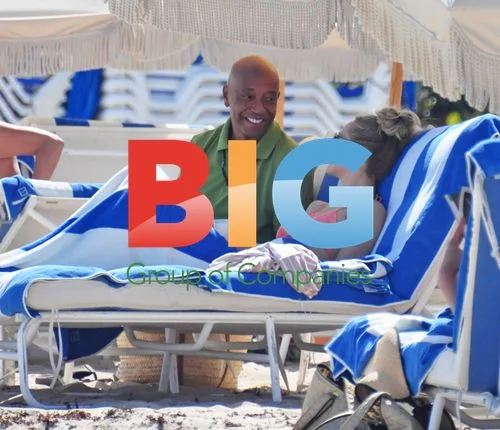 Russell Simmons Kisses New Girlfriend in Miami