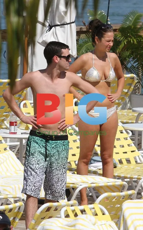 Tulisa and Gareth Varey by Miami Hotel Pool