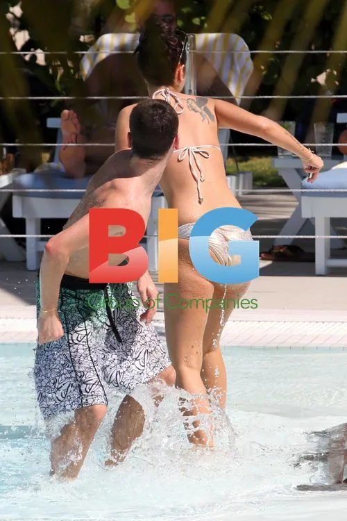 Tulisa Contostavlos pool relaxation