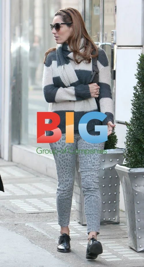 Kelly Brook Out with Friend in London
