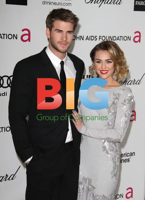 Miley Cyrus and Liam Hemsworth at Elton John AIDS Foundation Party