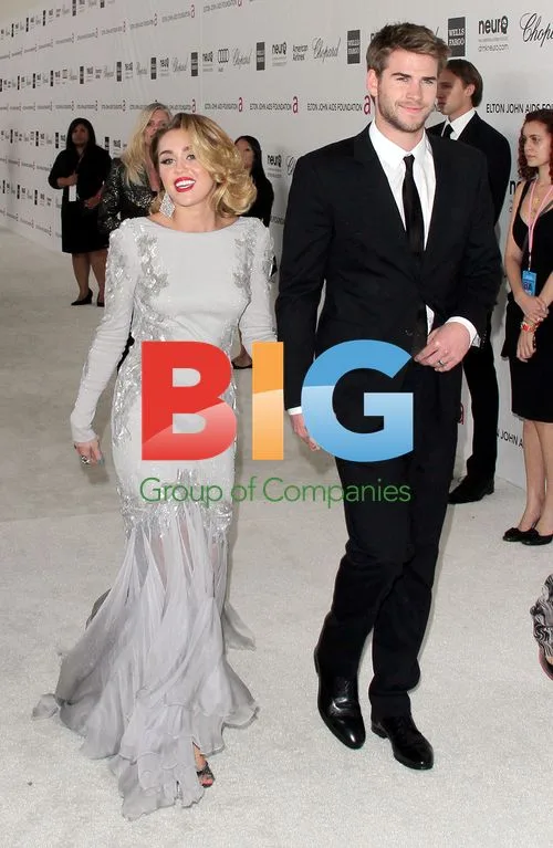 Miley Cyrus and Liam Hemsworth at Elton John AIDS Foundation Party