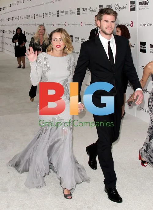 Liam Hemsworth and Miley Cyrus at Elton John AIDS Foundation Party