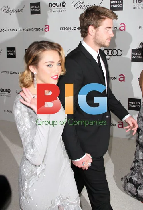 Liam Hemsworth & Miley Cyrus at Elton John AIDS Foundation Party