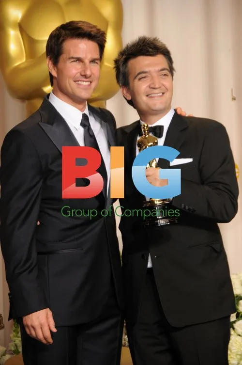Thomas Langmann and Tom Cruise at 84th Oscars