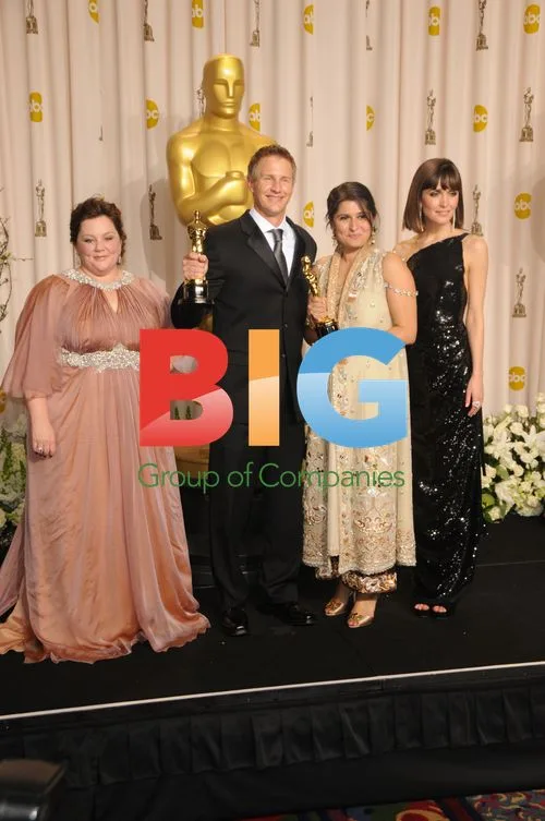 Melissa McCarthy, Daniel Junge, Sharmeen Obaid-Chinoy, and Rose Byrne at Oscars