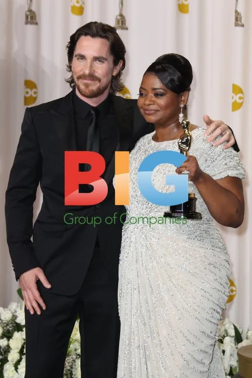 Christian Bale and Octavia Spencer at 84th Academy Awards