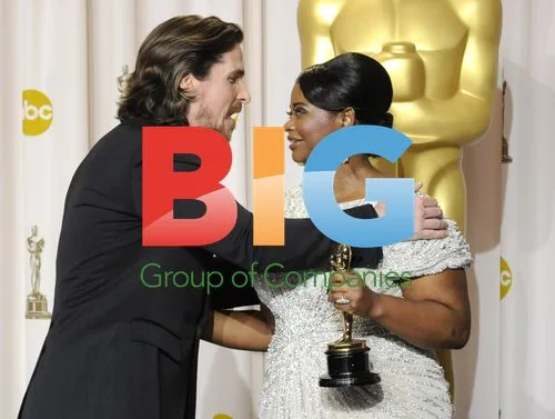 Christian Bale hugs Octavia Spencer backstage at Oscars