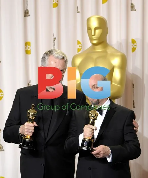 Mark Coulier and J. Roy Helland hold Oscars for "The Iron Lady"