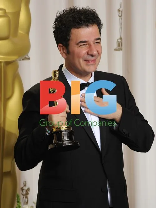 Ludovic Bource holds Oscar for 'The Artist'