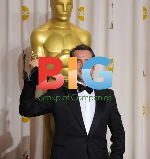Jean Dujardin Holds Oscar Backstage at Oscars