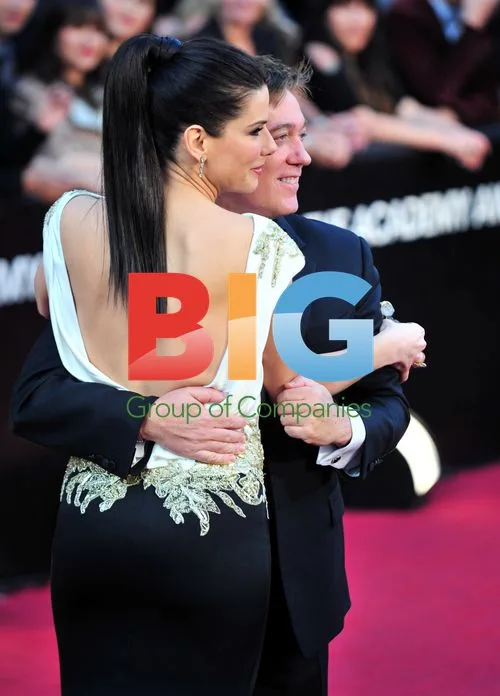 Sandra Bullock and Kevin Huvane at Oscars 2012
