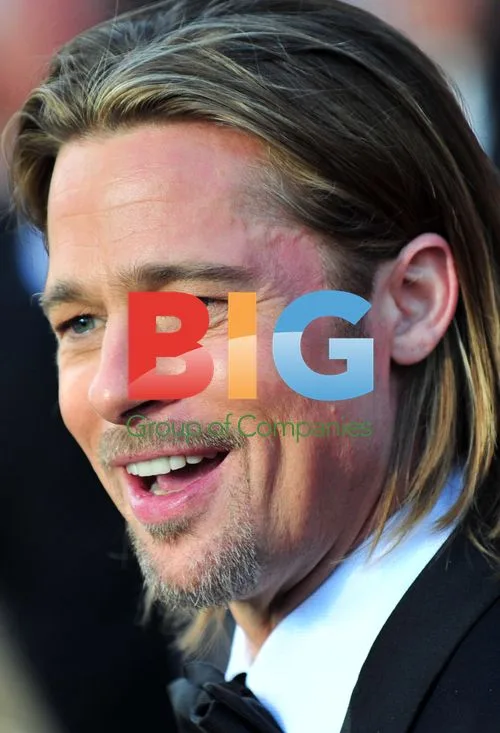 Brad Pitt arrives at 84th Oscars