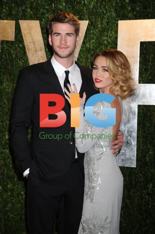 Miley Cyrus and Liam Hemsworth at Vanity Fair Oscar Party 2012