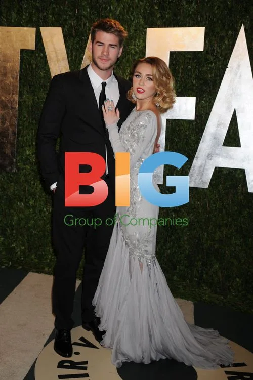 Miley Cyrus and Liam Hemsworth at Vanity Fair Oscar Party 2012