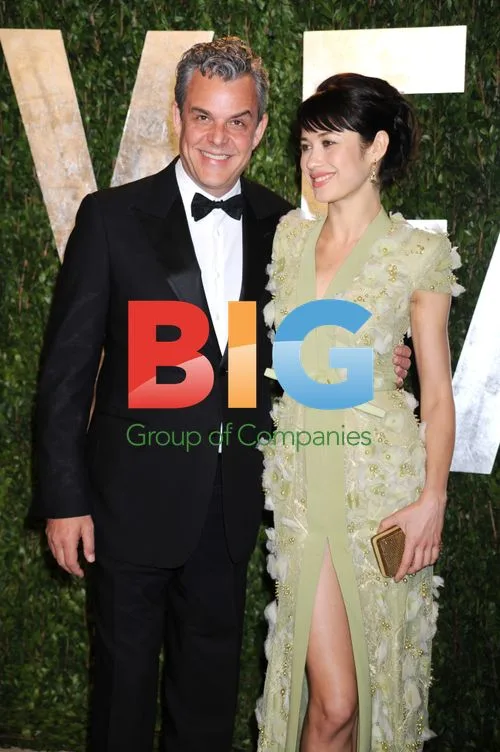 Olga Kurylenko and Danny Huston at 2012 Vanity Fair Oscar Party