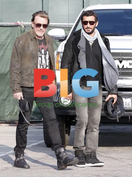Johnny Hallyday and Laeticia Ride Trikes in Malibu